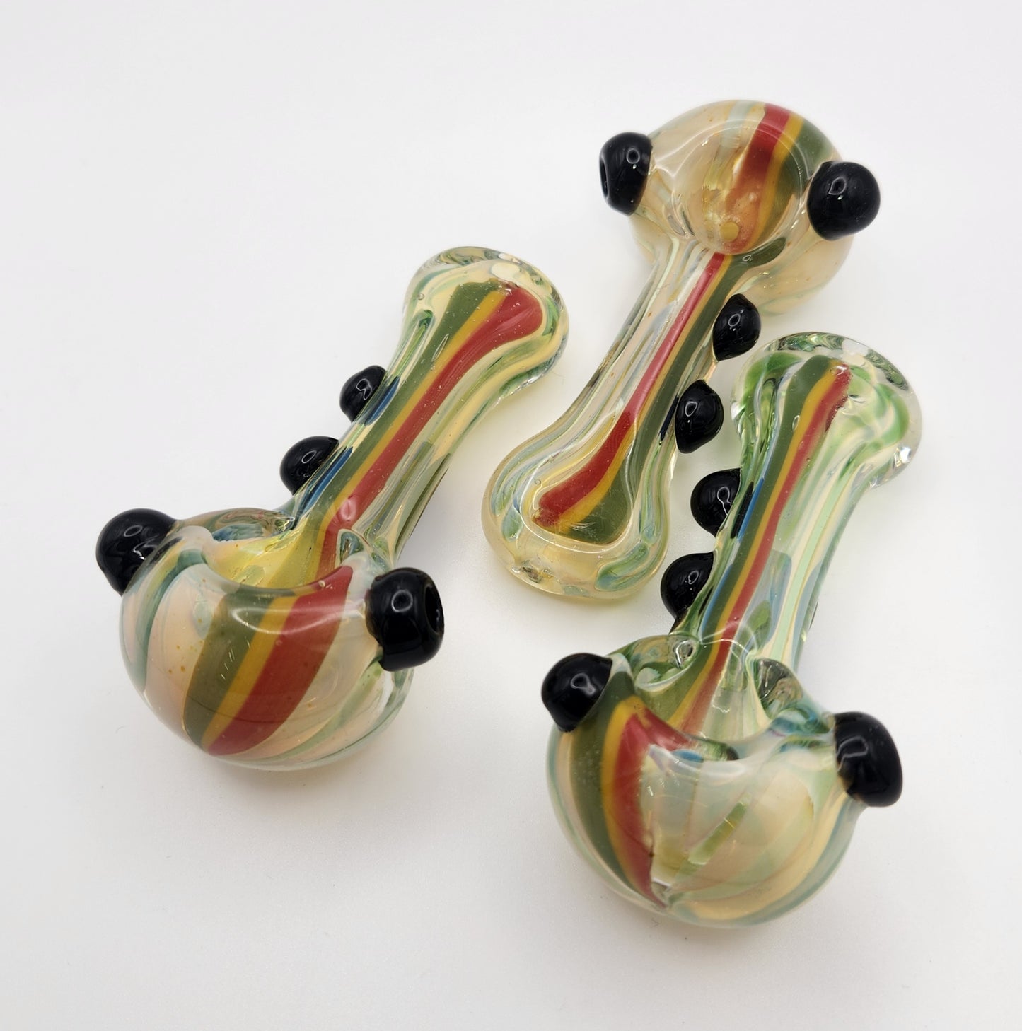 HAND PIPE WITH RASTA LINES MARBLES ON HEAD AND BODY